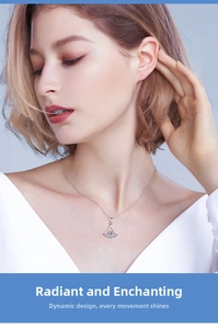 Detail of S925 sterling silver skirt-shaped pendant with a sparkling central gemstone