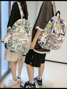 Waterproof graffiti print backpack with duck pendant for students and laptop storage