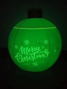 Macro detail of 60cm green LED PVC Christmas ball featuring Merry Christmas print