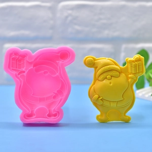 Detailed pink silicone mold with 3D Santa Claus figure for DIY soap or candle making