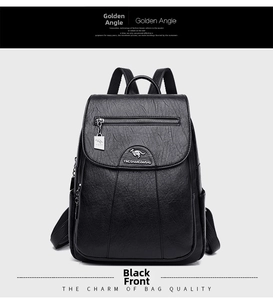 Detailed front view of black lychee grain leather backpack featuring a kangaroo metal logo
