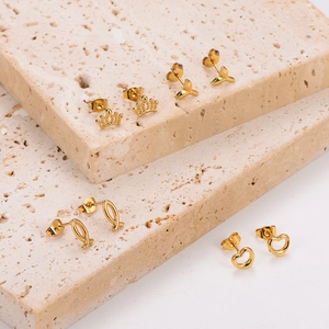Gold-plated 304 stainless steel stud earrings featuring heart, crown, and leaf designs