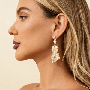 Bohemian crystal and pearl square drop earrings in gold finish worn by a model