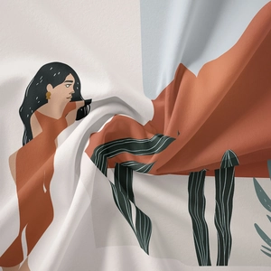 Detail showing soft fabric texture and abstract woman with cactus print on tapestry