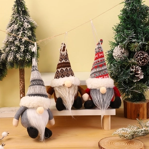 Three-piece knitted Christmas gnomes ornaments with plush beards and hanging strings