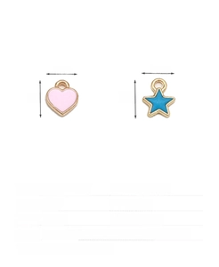 Detailed view of pink heart and blue star zinc alloy charms for DIY jewelry making