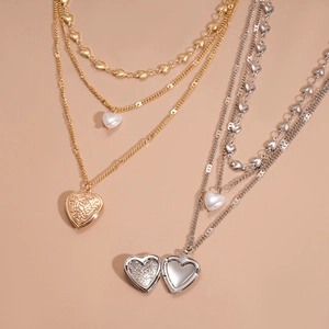 Three-layer vintage heart locket necklace with pearls and floral relief in gold and silver
