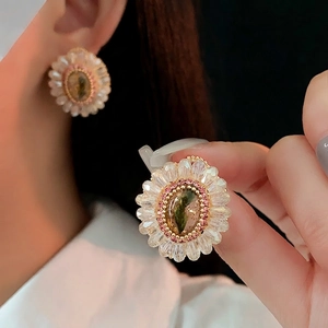 Vintage crystal floral stud earrings with green oval center and pink rhinestones
