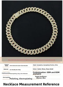 Close-up of 15mm gold Cuban link chain with detailed diamond-encrusted rhombic patterns