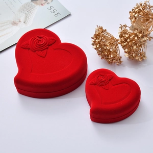 Red heart-shaped velvet jewelry boxes with embossed rose in large and small sizes