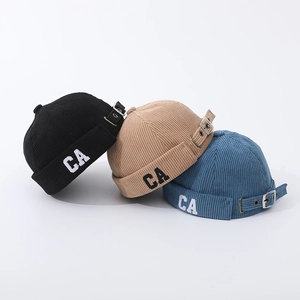 Baby corduroy docker hats in black, khaki, and blue with CA embroidery and adjustable straps