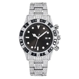 Luxurious silver diamond-encrusted quartz watch with green sunburst dial and luminous hands