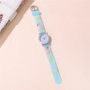 Close-up of light blue kids watch with flamingo pattern and soft silicone strap