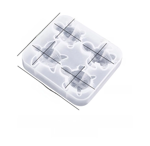 Macro shot of a 4-cavity turtle silicone mold with precise dimensions for DIY resin crafts