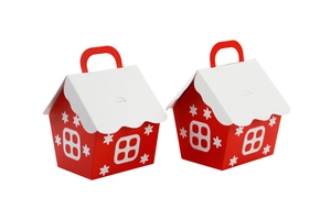 Detail of red house-shaped Christmas candy gift boxes with white snowy roof and handles