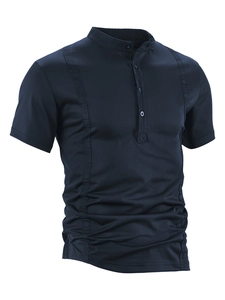 Detailed view of dark navy polo shirt with micro-twill texture and four-button stand collar