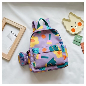 Detailed top view of purple floral kids backpack with matching round coin purse