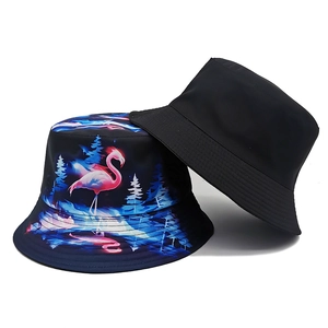 Minimalist black and flamingo print bucket hats displayed on a clean white background