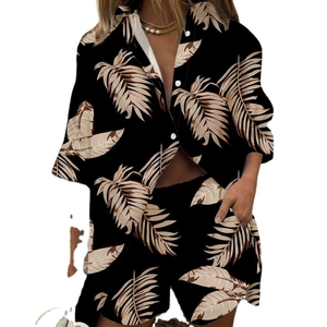 Women's 2-piece summer lounge set with tropical leaf print shirt and drawstring shorts