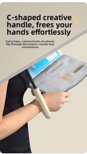 Close-up of C-shaped ergonomic handle on inverted umbrella for hands-free use
