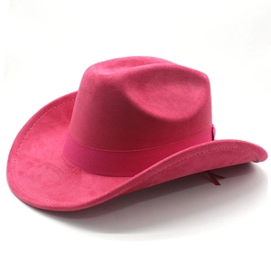 Detail of a magenta suede western cowboy hat with silk decorative band and upturned brim
