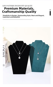 Detail view of various necklaces displayed on premium velvet jewelry bust stands