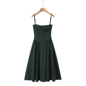 Dark green backless spaghetti strap maxi dress with corset style top and pleated A-line skirt