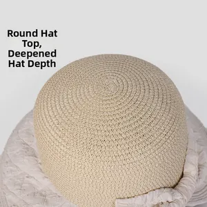 Macro view of woven straw sun hat with deep round crown and fine spiral texture