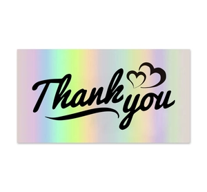 Detailed macro view of holographic rainbow Thank You card with elegant black calligraphy