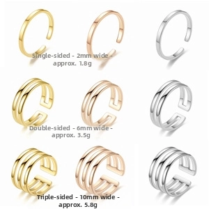Detail view of open titanium steel rings in 2mm, 6mm, and 10mm widths and three colors