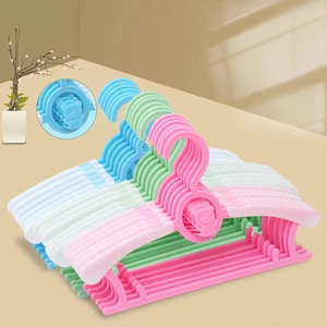 Adjustable non-slip cartoon kids hangers in pink blue green and white for closet space saving