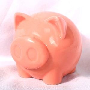Close-up of a cute pink pig silicone mold with a smooth glossy finish for DIY resin crafts