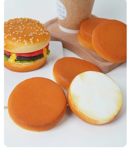 Detailed view of artificial PU burger model with realistic sesame and lettuce texture