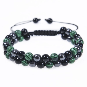 Detail of adjustable double-row beaded bracelet with amethyst, malachite, and hematite beads