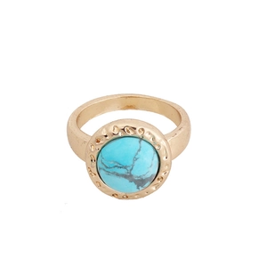 Bohemian style gold ring with round green turquoise stone and textured metallic rim