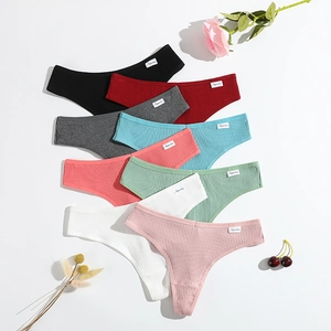 Set of 8 ribbed cotton thongs for women in assorted colors with elastic waistbands