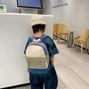 Minimalist canvas backpack for kids 3-6 years in green and blue colorblock design