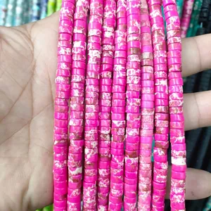 Macro shot of rose pink marble textured disc beads for DIY jewelry making accessories