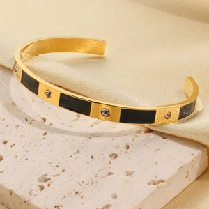 Elegant 18K gold-plated C-shaped open bangle with black enamel and zircon stones