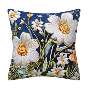 Close-up of elegant 3D floral embroidery on deep blue decorative square cushion cover