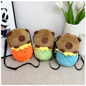 Detailed close-up of colorful plush Capybara crossbody bags in orange, green and blue