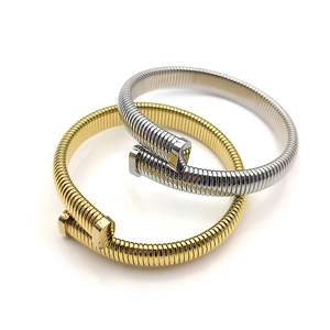 Brazaletes de clavo Tubogas en acero inoxidable dorado y plateado con diseño de espiral