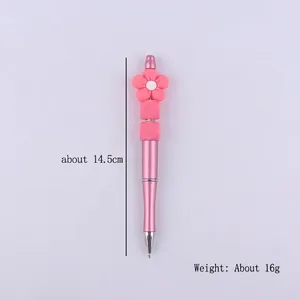 Pink creative DIY beaded ballpoint pen with silicone flower and geometric cube beads