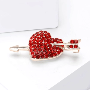 Elegant gold heart brooch with red rhinestones in Cupid arrow design for women suit
