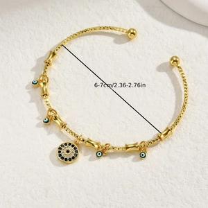 Adjustable golden Evil Eye cuff bracelet with blue pendants and rhombus texture