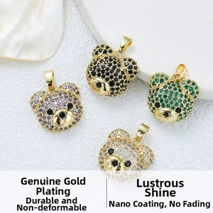 Detail of 18K gold plated bear pendants with micro-pave zircons in multiple colors