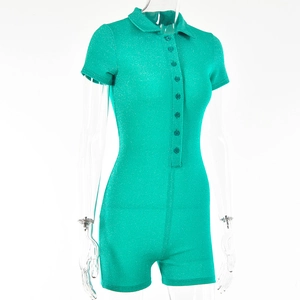 Detail of green short sleeve polo collar romper showing the button front and shiny fabric