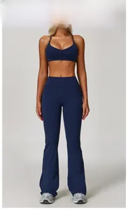 Set yoga blu da donna con reggiseno sportivo a spalline e pantaloni svasati a vita alta
