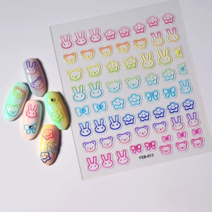 Macro view of FEB-813 3D embossed nail art stickers with cute rainbow bears and bows