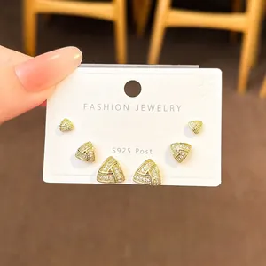 Elegant gold triangle zircon stud earrings set with S925 silver posts for women